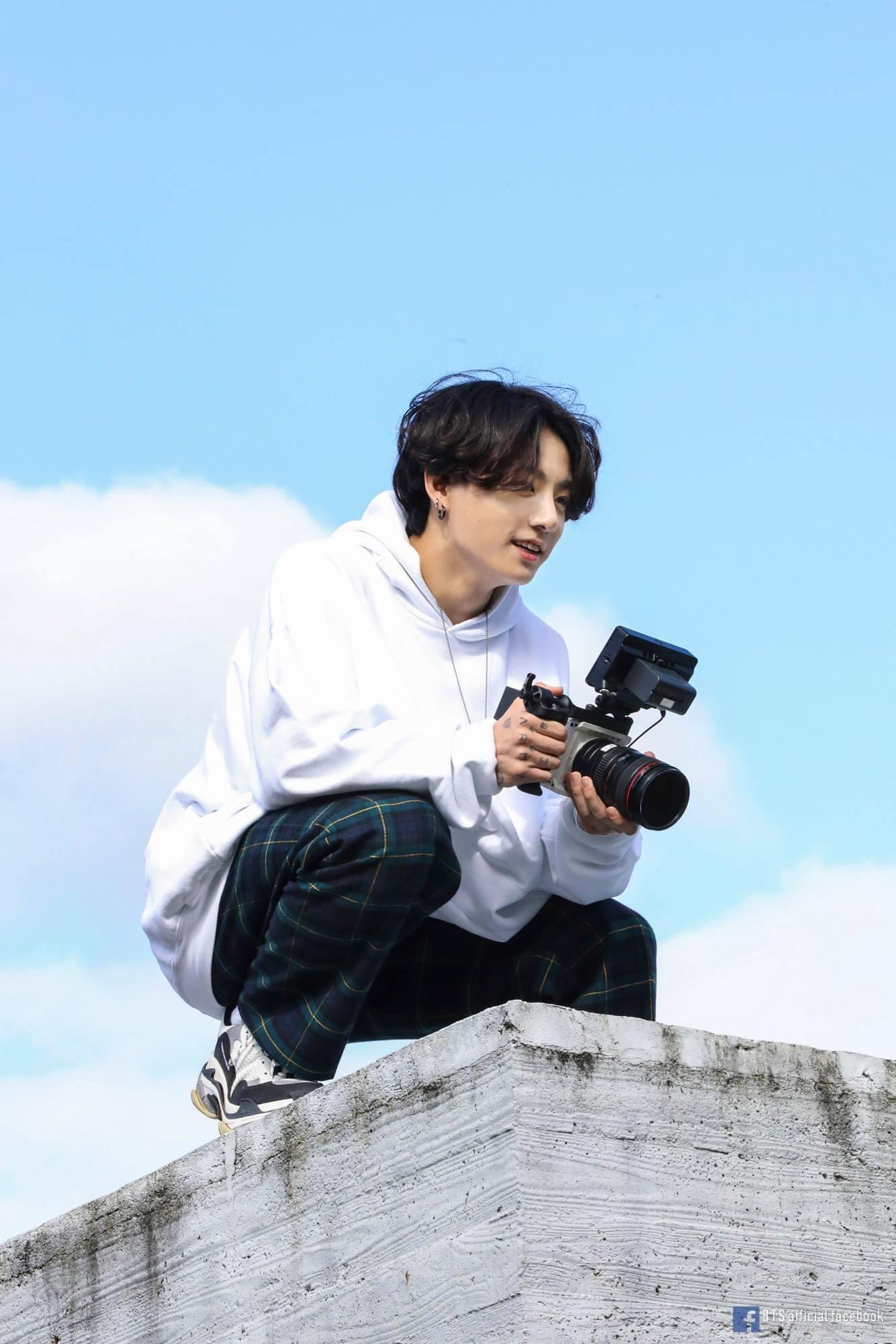 Jungkook in a recording booth